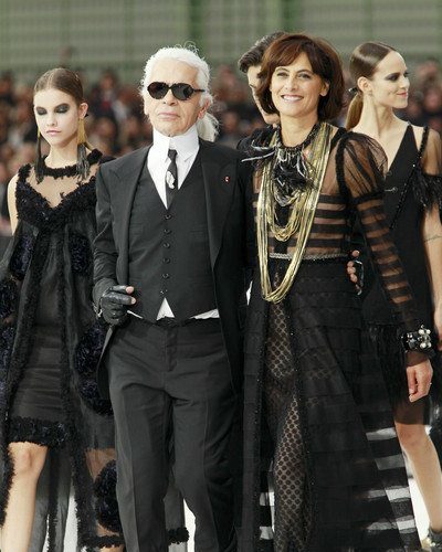 Designer Karl Lagerfeld with Former model Ines de La Fressange appear  during the Chanel spring-summer 2011 ready-to wear collection presentation  held at the Grand Palais in Paris, France on October 5, 2010.