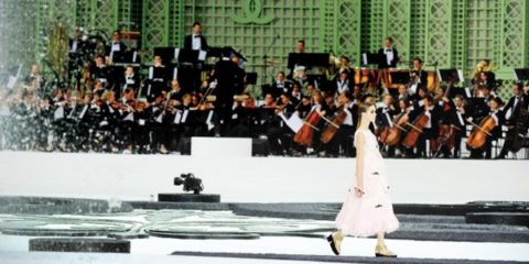 An 80-strong Philharmonic Orchestra at Chanel Spring 2011. Photography by Peter Stigter.