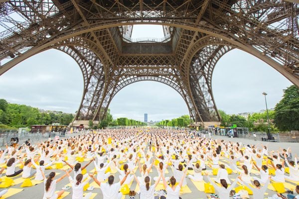 Forget the baguettes, it's all about doing yoga at the Eiffel