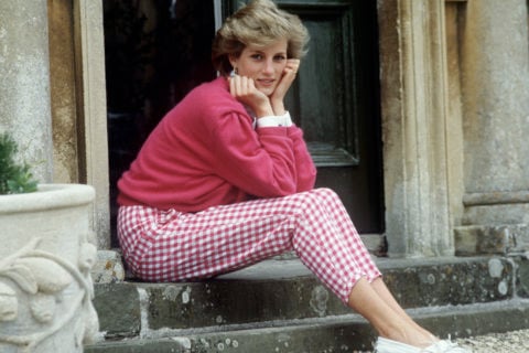 iconic princess diana looks will never go out of style, and this photo of Lady Di in a magenta sweatshirt and gingham pants proves it