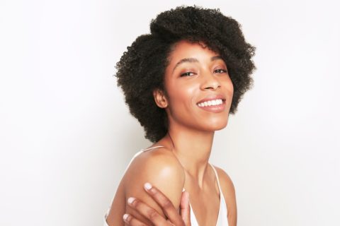 Woman with short curly hair