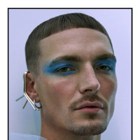 Man with blue eyeshadow