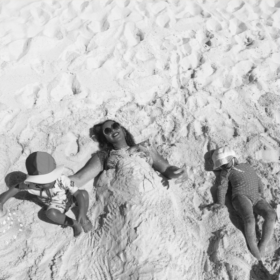 Beyonce and her kids playing in sand
