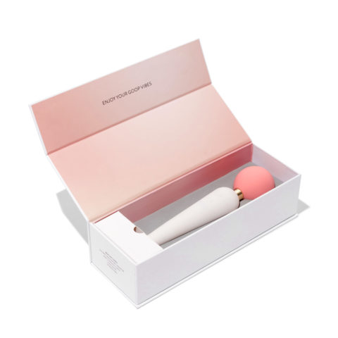 A photo of the first-ever Goop vibrator in its white and pink box