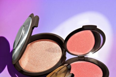 An aerial shot of three BECCA Cosmetics products to accompany a story about Becca Cosmetics closing