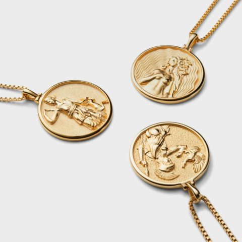international women's day products: Three gold pendants made by Awe Inspired