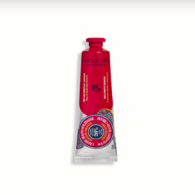 A red tube of L'Occitane's Solidarity Hand Cream