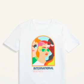 A colourful T-shirt feature three women's heads that reads "International women's day"
