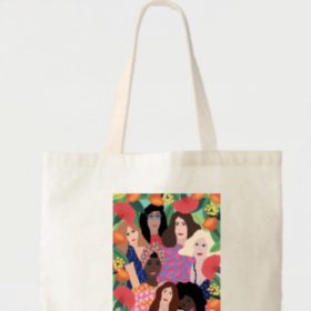 A tote bag with a colourful illustration of a group of women on the front