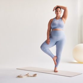 Ashley Graham in Knix Active blue leggings and bra