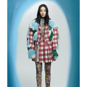 shuting qiu chinese designers model in red and white checkered skirt and jacket with blue fur and patterned leggings