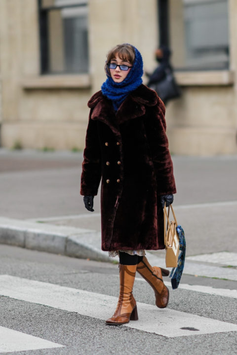 woman in fluffy coat and balaclava
