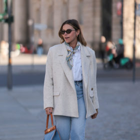 a classic style scarf worn with an oversized blazer and jeans
