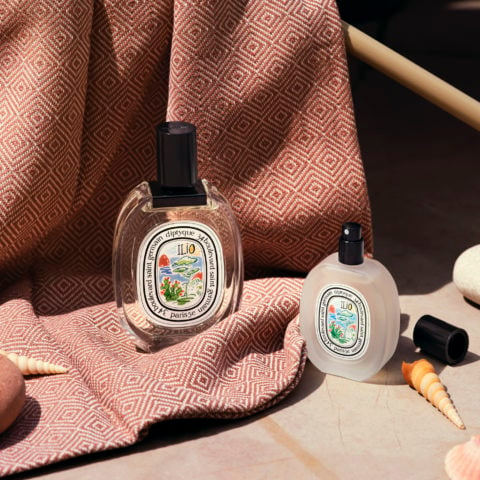 Two bottles of Diptyque perfume