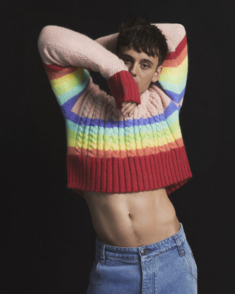 man in a rainbow coloured sweater part of Ami Paris pride collection