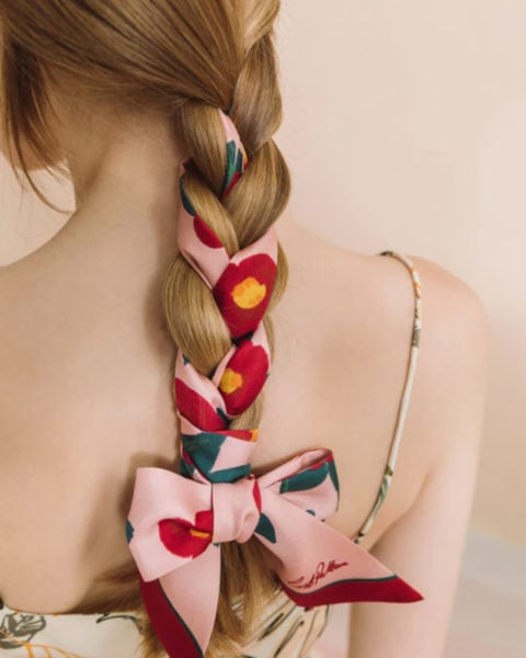 A braid with a ribbon tied into it