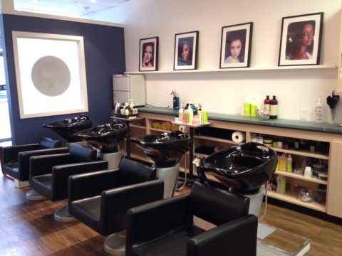 inside toronto-based salon curl bar. multiple chairs are seen side by side