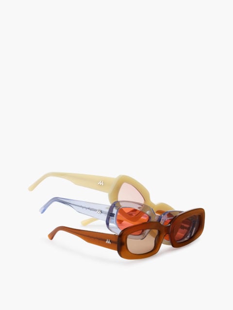 Three pairs of Maguire sunglasses stacked on top of each other
