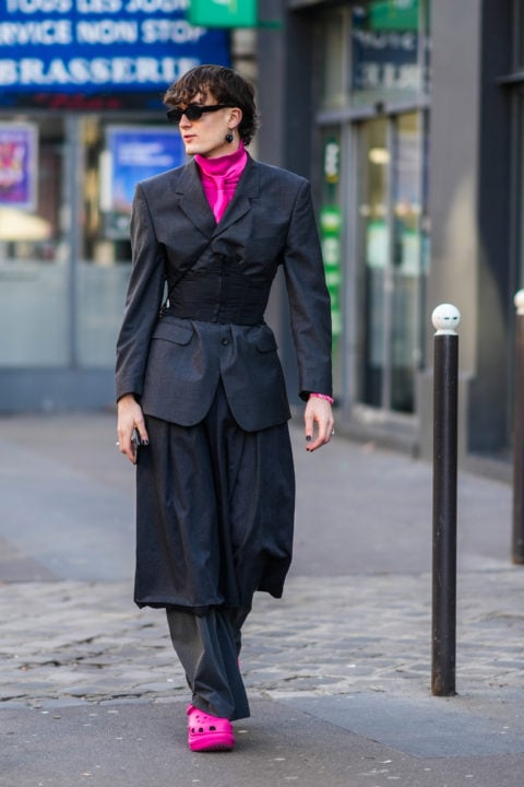 How to style crocs with a black suit, pink top and pink Crocs