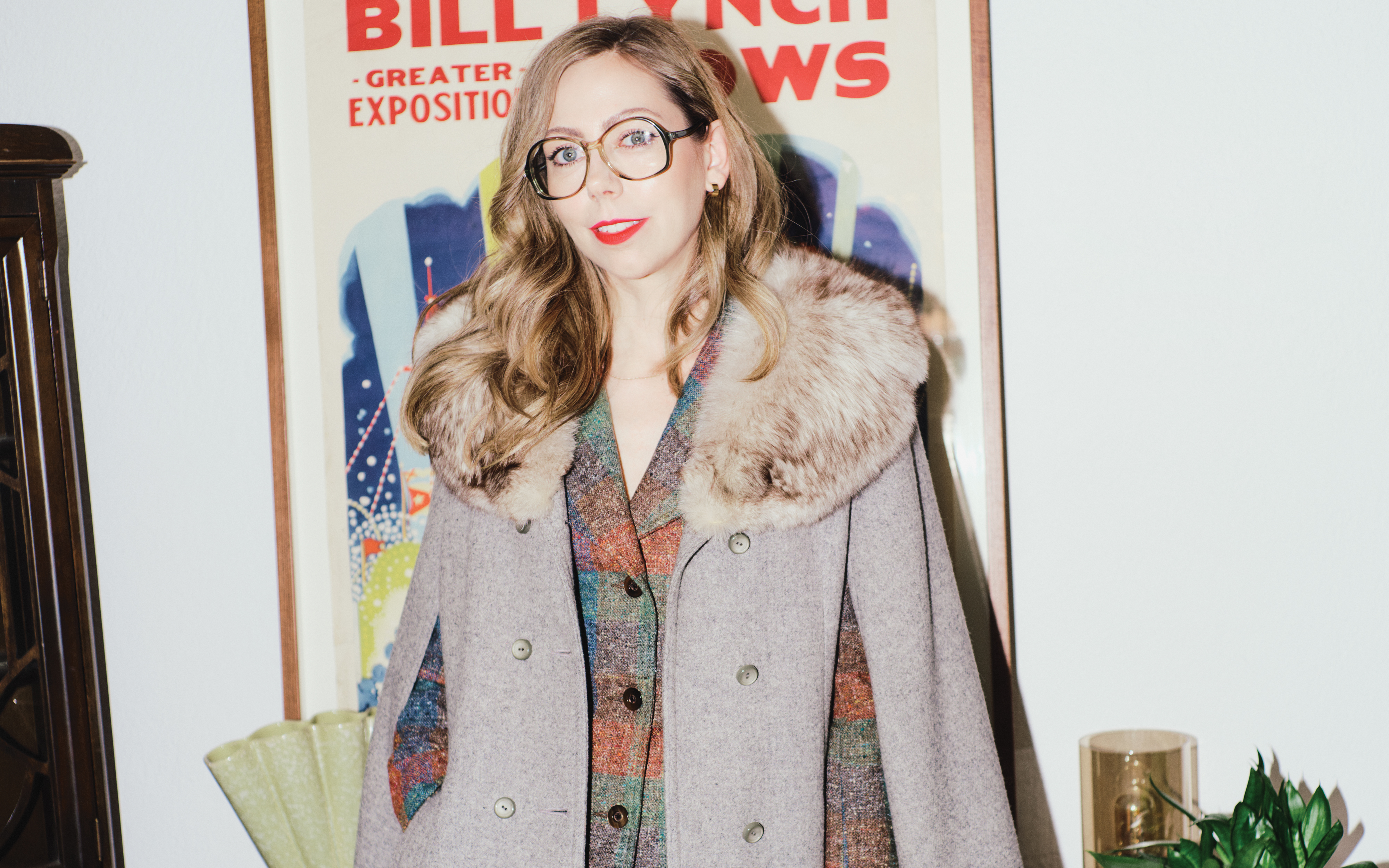 Vintage clothing retailer Dana Richardson-Blewett in a vintage cape with fur collar