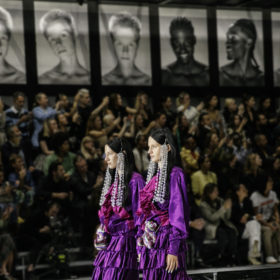 Twins in purple dresses at Gucci Spring 2023 Twinsburg