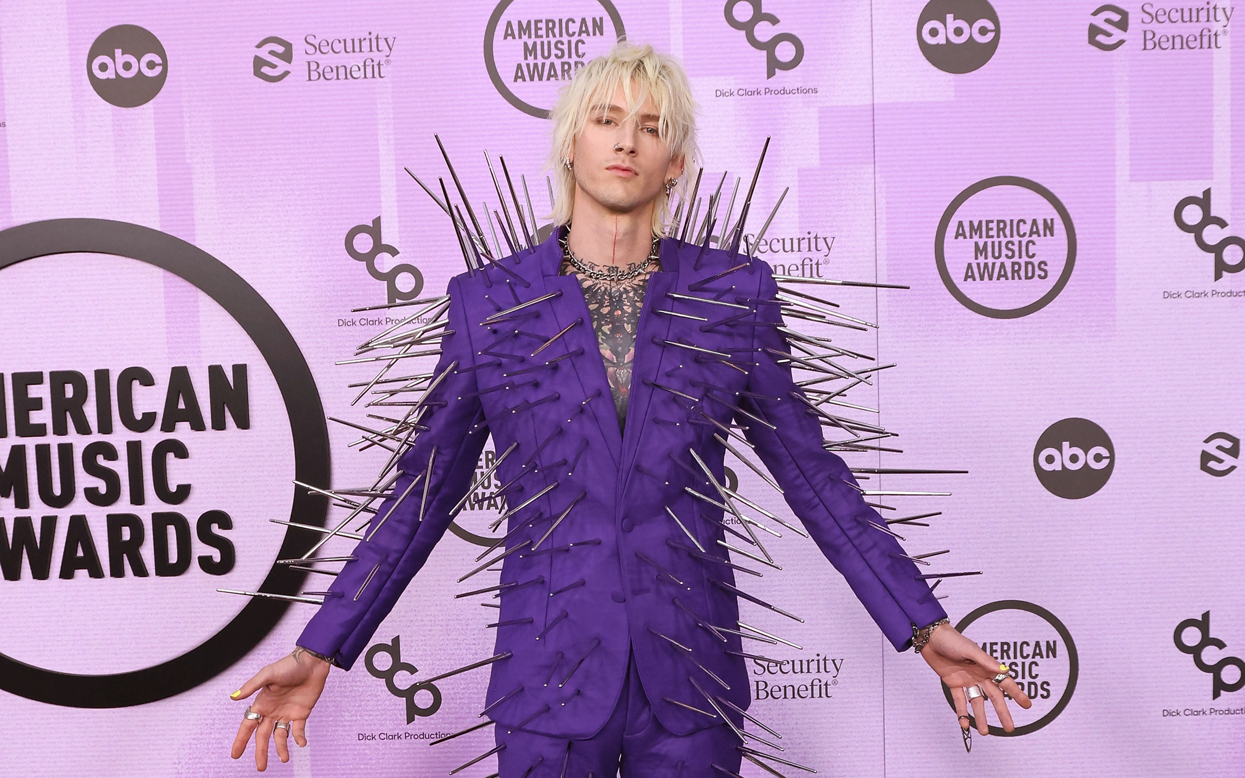 Machine Gun Kelly AMA Outfit: A Purple Suit Covered in Spikes