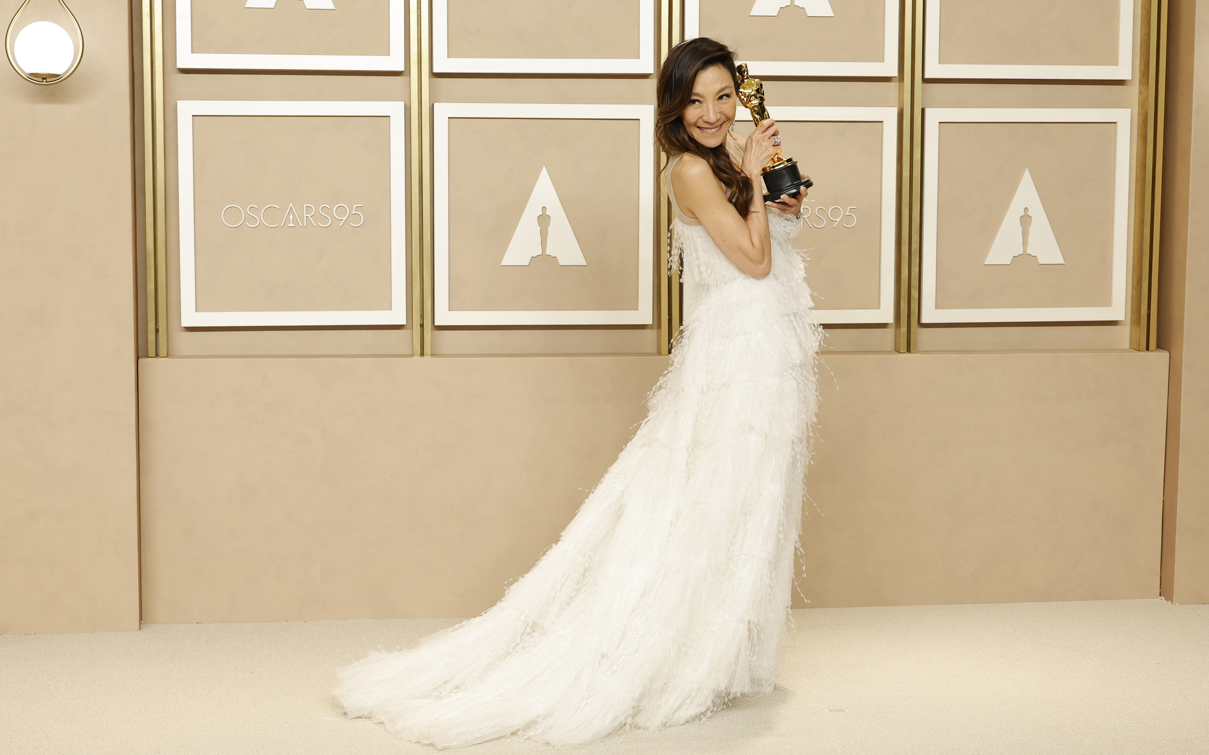 Michelle Yeoh and the Symbolism of White Dresses at the 2023 Oscars -  FASHION Magazine
