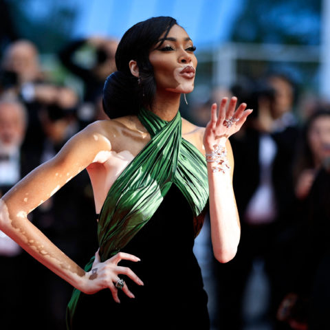 winnie harlow poses and blows a kiss on the cannes 2023 red carpet