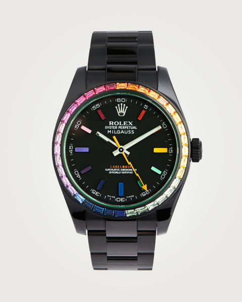 rainbow watches: a customized black rolex with rainbow gemstones lining the bezel