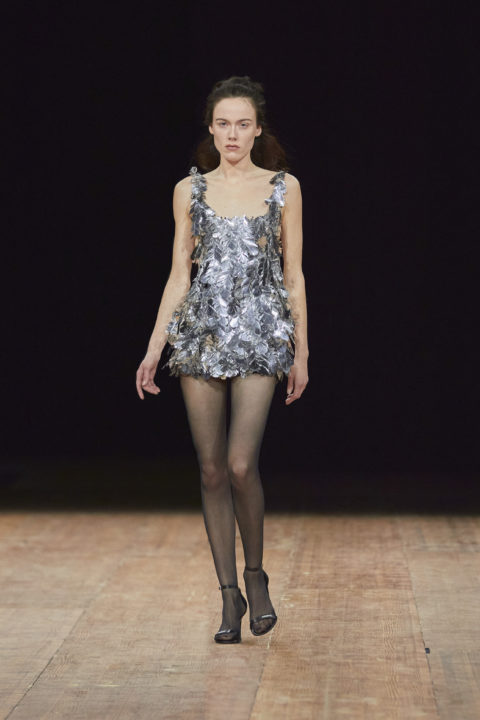 Model wearing silver trend Coperni dress