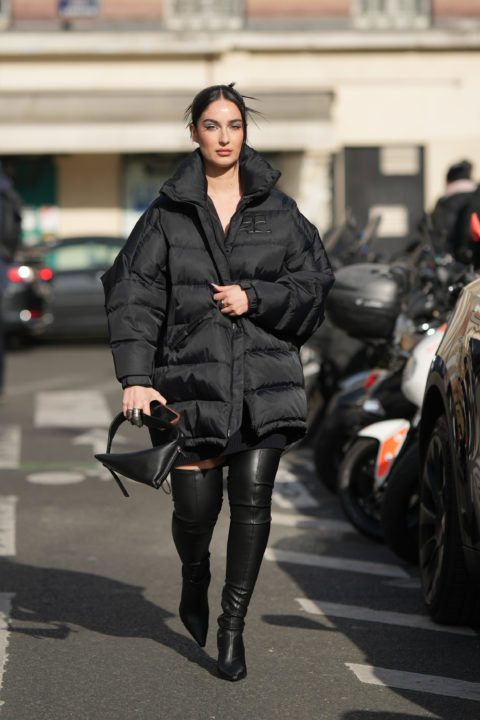 woman wearing a black puffer coat, long down coat