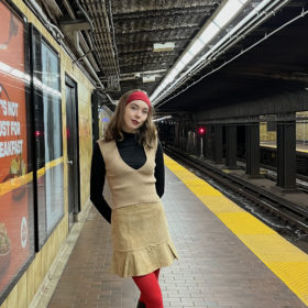 red tights outfit beige skirt 