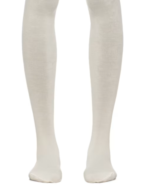 Product shot of merino wool tights in white from SSENSE