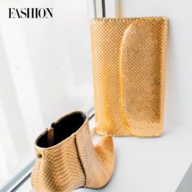 Thrifted metallic gold clutch with gold snakeskin boot