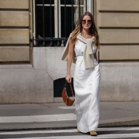 Street style model wears white linen dress