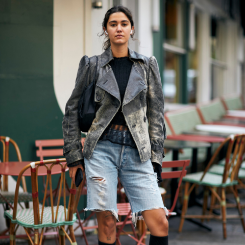 street style photo of woman wearing jean shorts