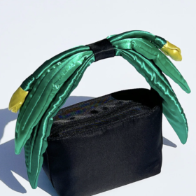 Black bag with green and yellow tulip handle